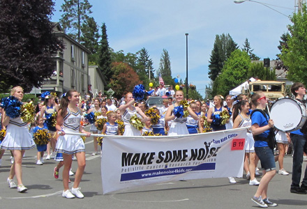 BHS Cheer Team Marching for Make Some Noise NW at the 2014 Grand Old 4th Parade on Bainbridge Island